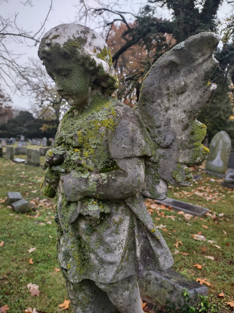 more statues at the cemetery on a rainy&nbsp;afternoon